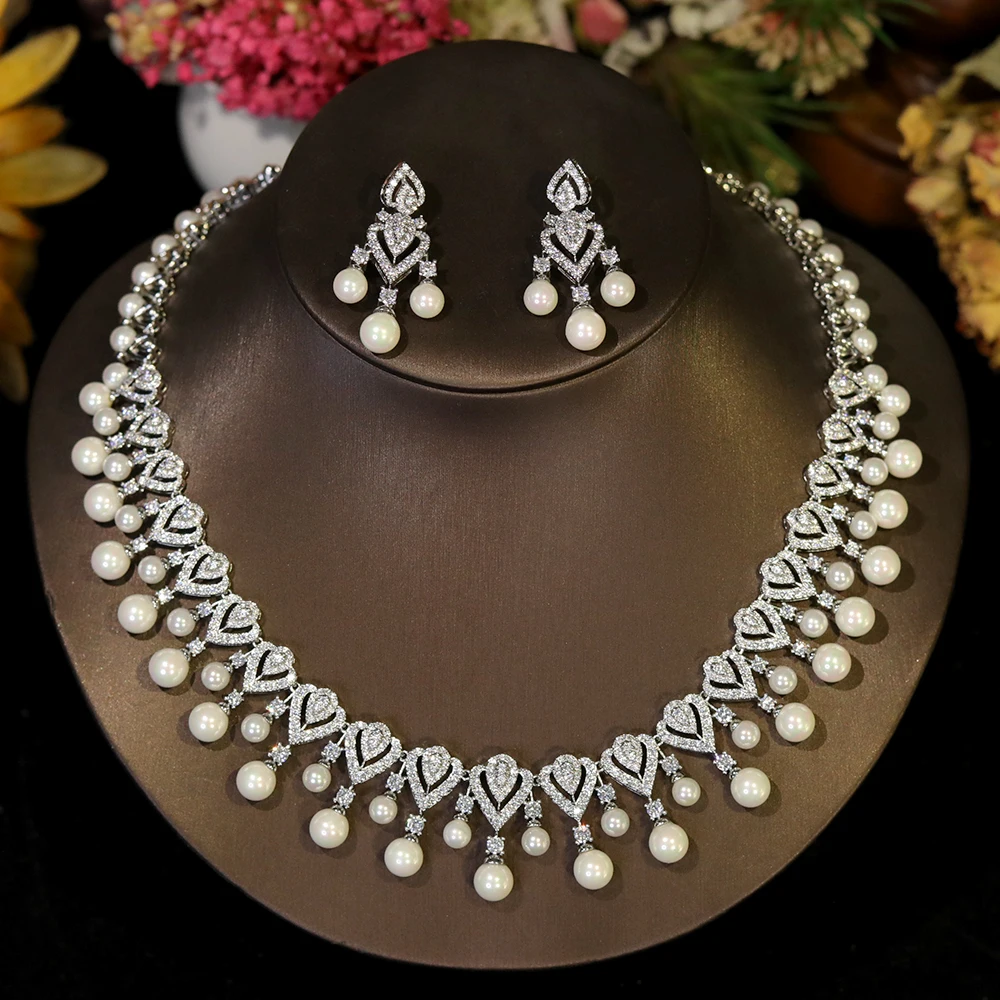 Elegant pearl necklace for women, showcasing a string of lustrous white pearls on a delicate jewelry piece.
