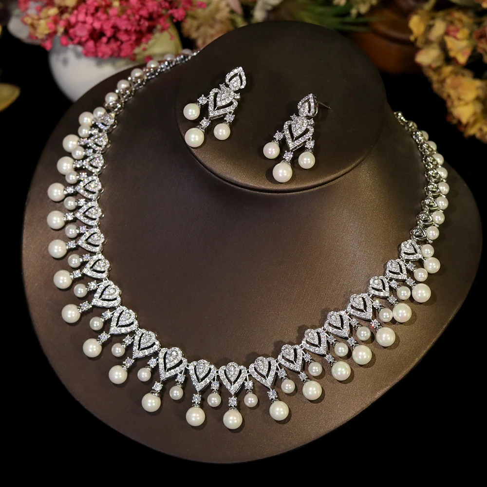 Elegant pearl necklace for women, showcasing a string of lustrous white pearls on a delicate jewelry piece.