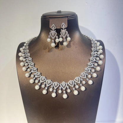 Elegant pearl necklace for women, showcasing a string of lustrous white pearls on a delicate jewelry piece.